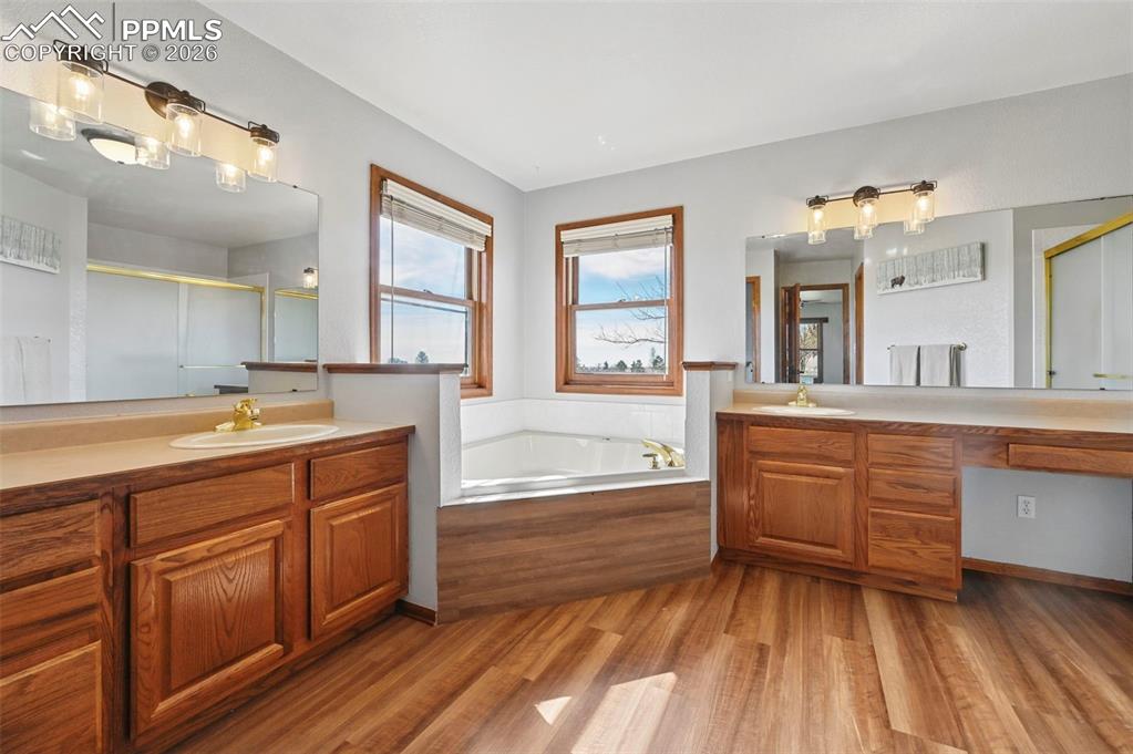 Image 17 of 49: Large Primary Bedroom with Large Closet and Sitting Area