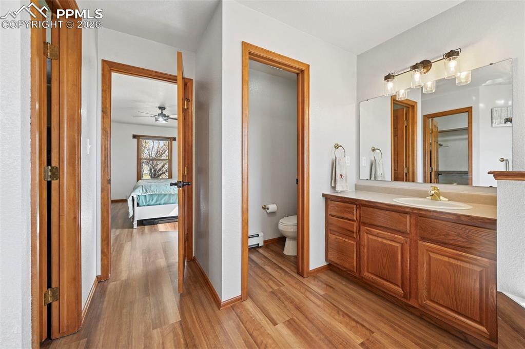 Image 20 of 49: Vanity with Sitting Area