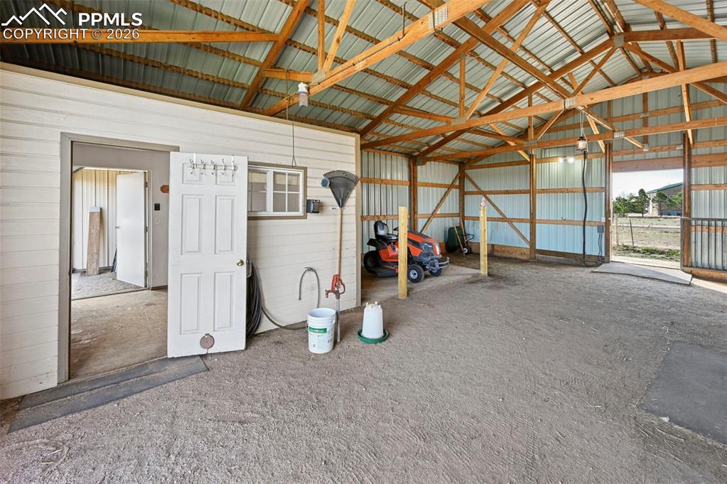 Image 37 of 49: Horse Barn and 3rd Garage/ RV parking on East Side of Barn