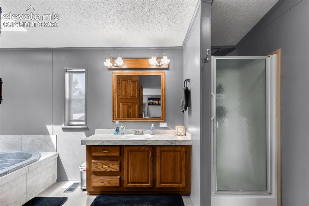 Image 10 of 27: Master Bathroom