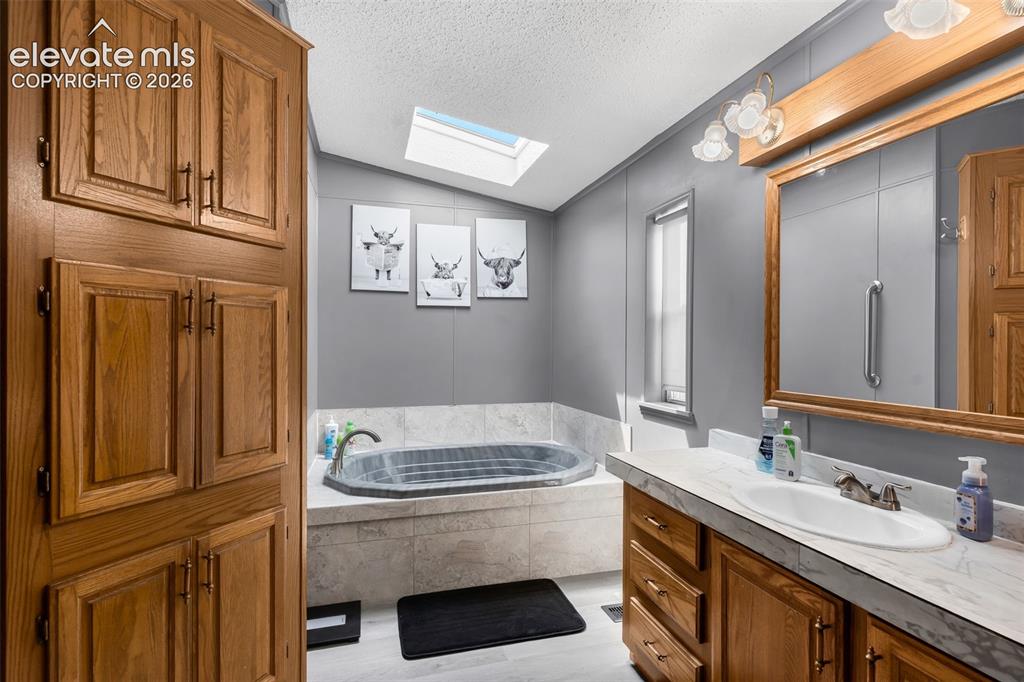 Image 11 of 27: Master Bathroom