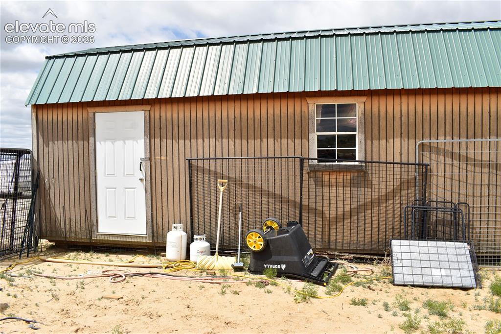 Image 16 of 16: side of shed