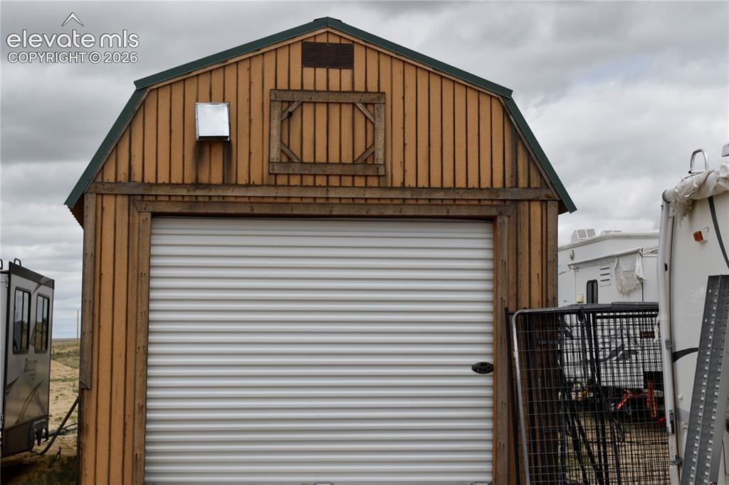 Image 8 of 16: front of shed