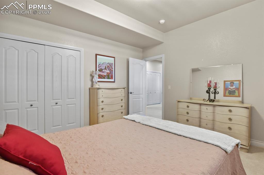 Image 32 of 46: Another view of the third bedroom neutral paint and carpeted flooring.