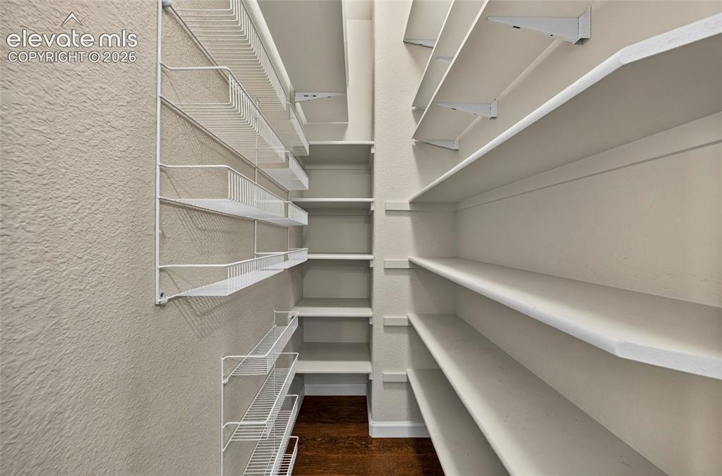 Image 10 of 43: Convenient panrty provides additional storage space for groceries.