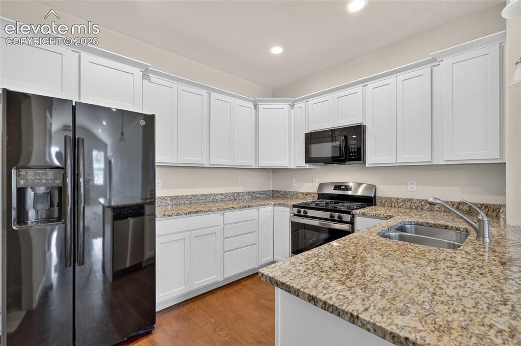 Image 12 of 43: Kitchen with generous counter space.