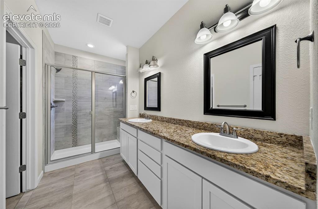 Image 16 of 23: Primary Bathroom