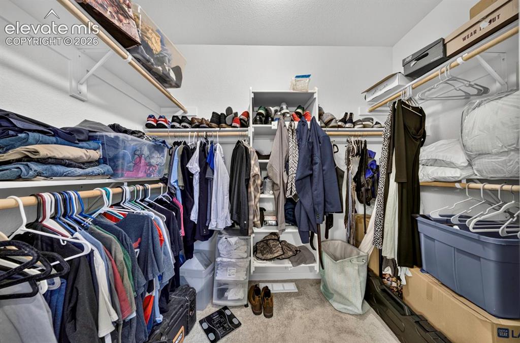 Image 17 of 23: Primary Closet