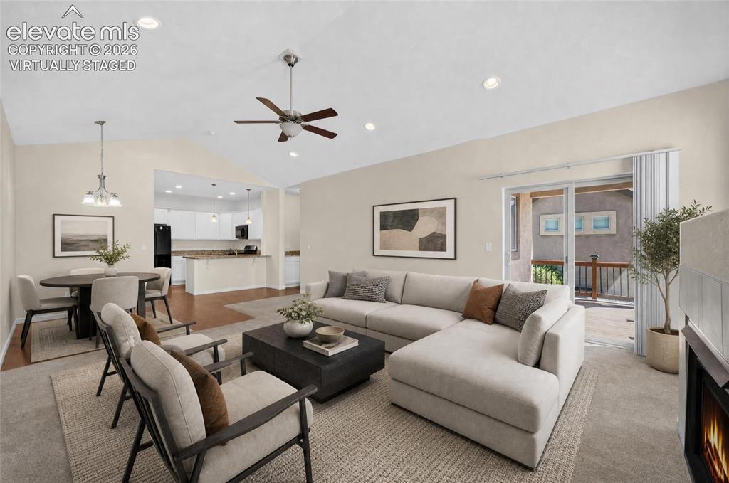 Image 19 of 43: Virtually staged living room.