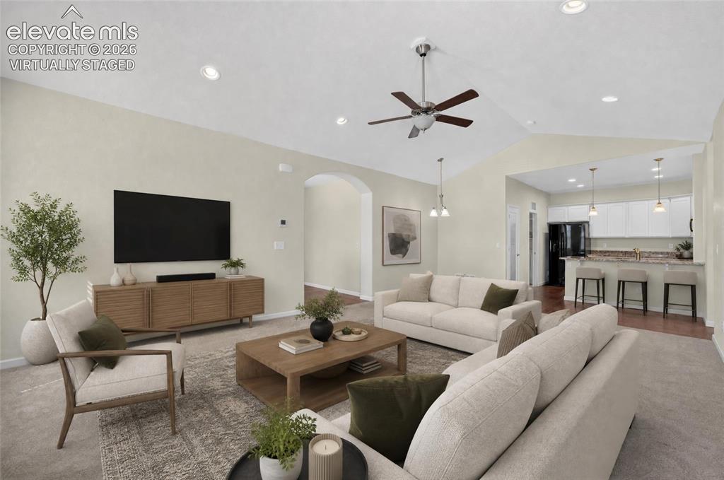 Image 20 of 43: Virtually staged living room.