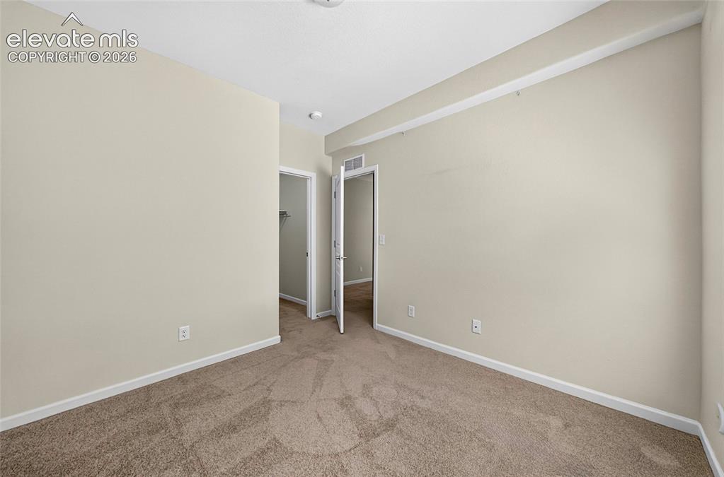 Image 30 of 43: Bedroom four. Bright flex space for family and guests.