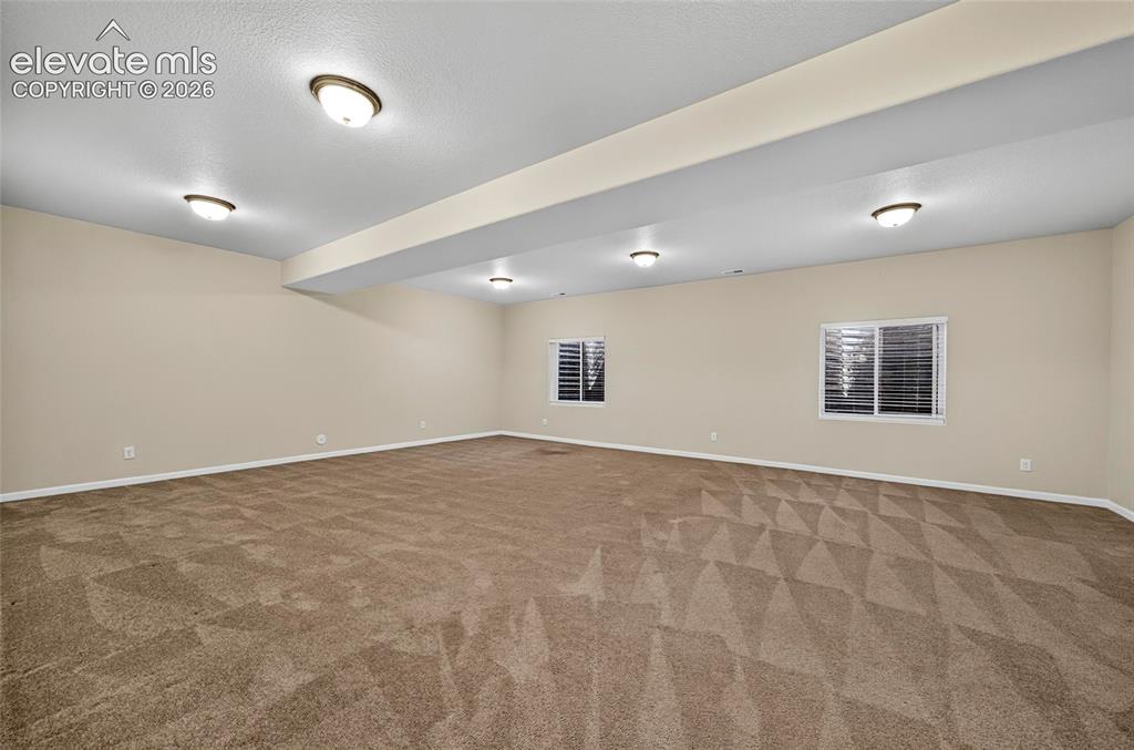 Image 35 of 43: Oversize living room perfect for entertaining guests and movie night.