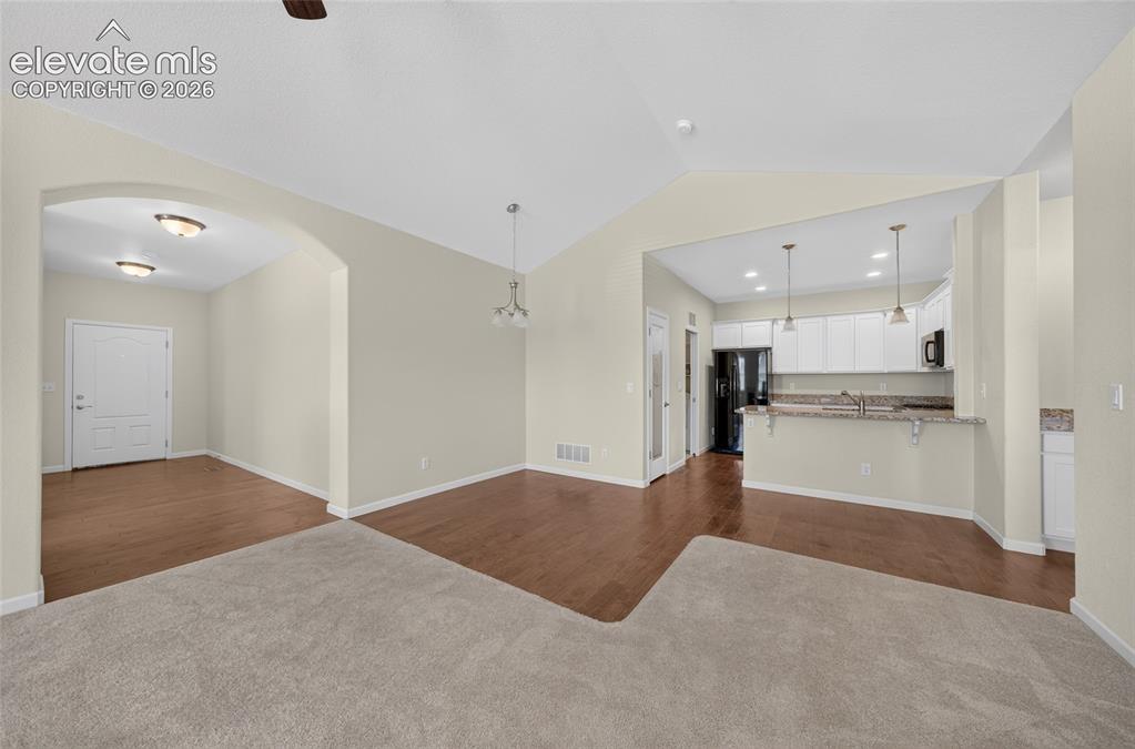 Image 6 of 43: Enjoy the spacious, open concept layout that seamlessly connects the living