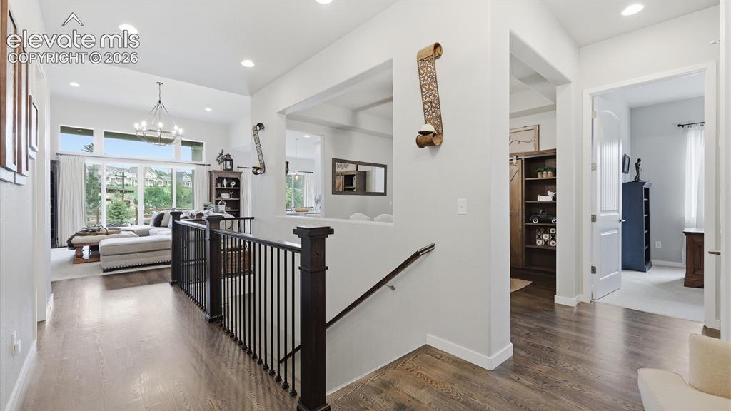 Image 11 of 50: A GRAND FIRST IMPRESSION — A welcoming entry foyer and beautifully designed