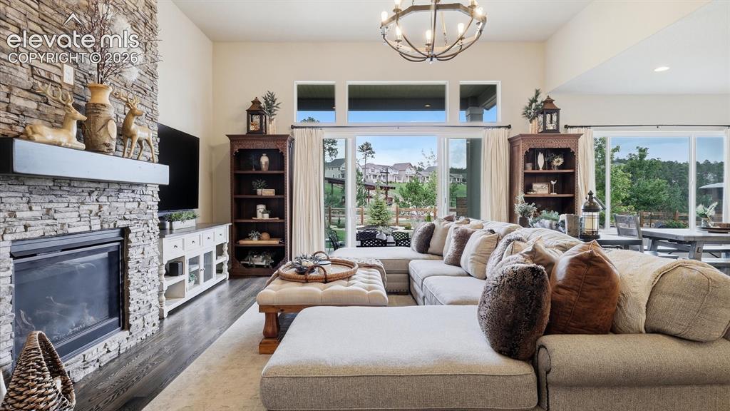 Image 12 of 50: SOARING SOPHISTICATION — Dramatic 13-foot ceilings elevate this stunning li
