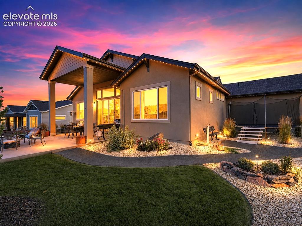 Image 19 of 50: ENTERTAIN UNDER THE COLORADO SKY — Gather around the fire pit, dine al fres