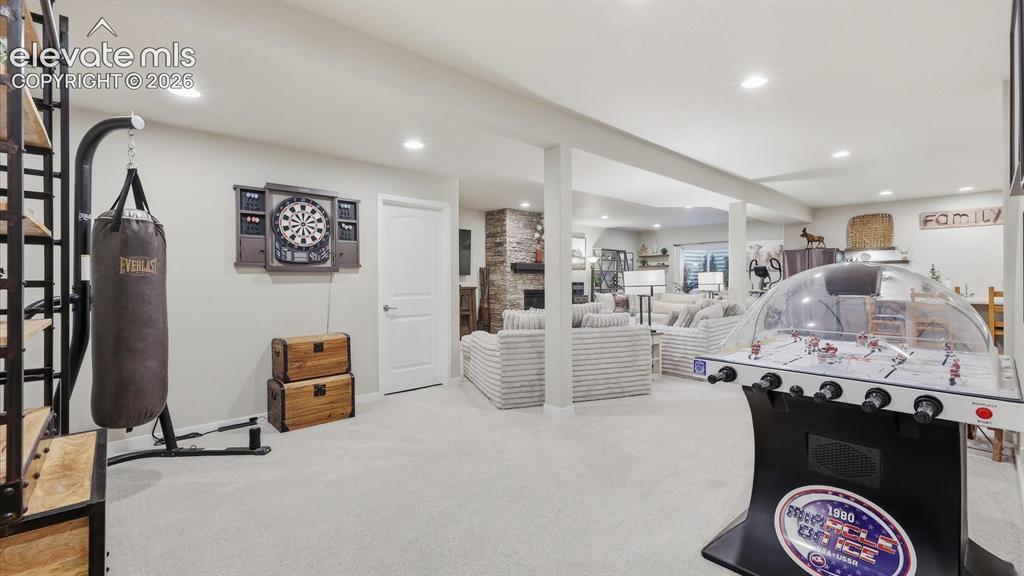 Image 35 of 50: THE ULTIMATE GAME ZONE — Designed for fun and flexibility, this spacious lo