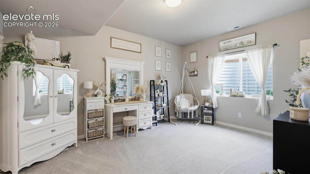 Image 38 of 50: SPACE WITH POSSIBILITIES — Generous proportions make this bedroom equally s