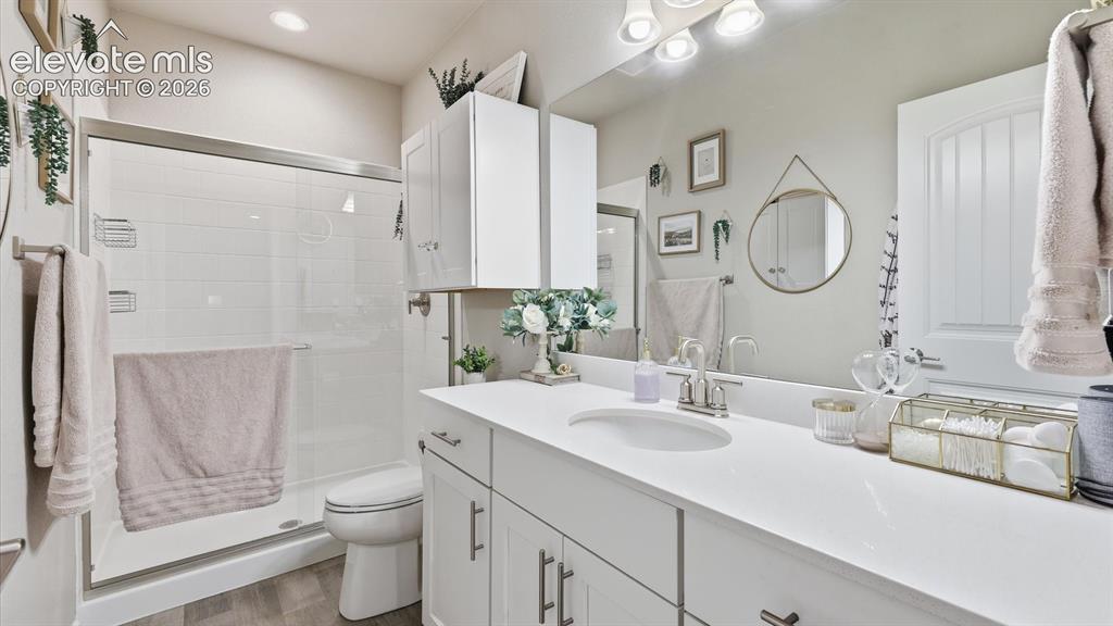 Image 39 of 50: EVERY DETAIL CONSIDERED — Even the fifth bathroom reflects the home’s commi