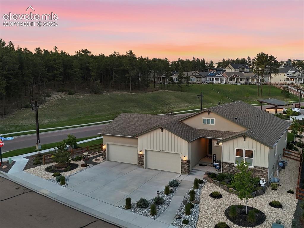 Image 42 of 50: WHERE PRIVACY MEETS NATURE — Tucked into a quiet corner lot with tranquil f
