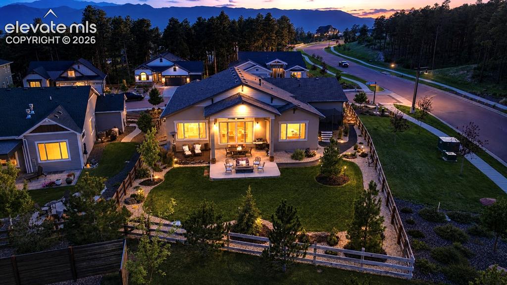 Image 46 of 50: DRAMATIC SETTING, TIMELESS BEAUTY — Commanding a striking corner-lot positi
