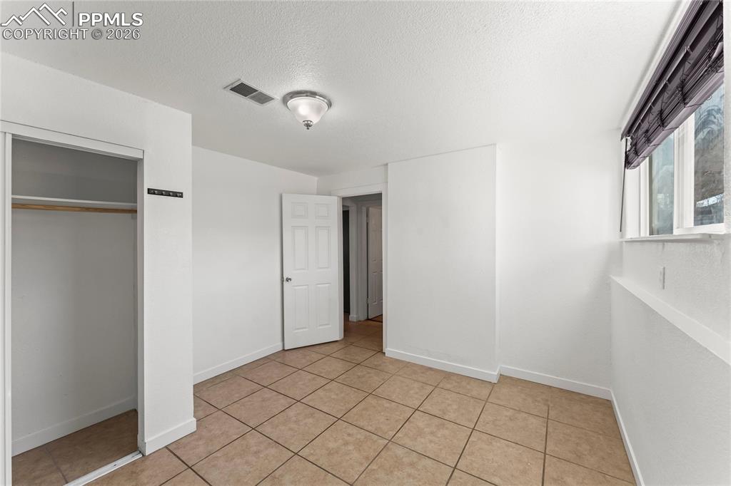 Image 33 of 41: Bedroom