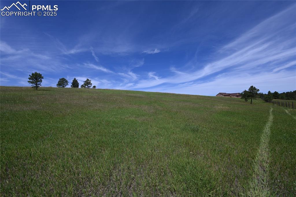 Image 19 of 29: View of yard with a view of countryside