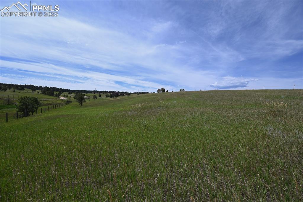 Image 21 of 29: View of yard with a rural view