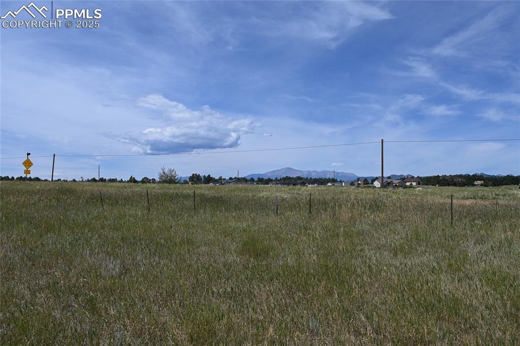 Image 25 of 29: View of yard featuring a rural view and a mountain view