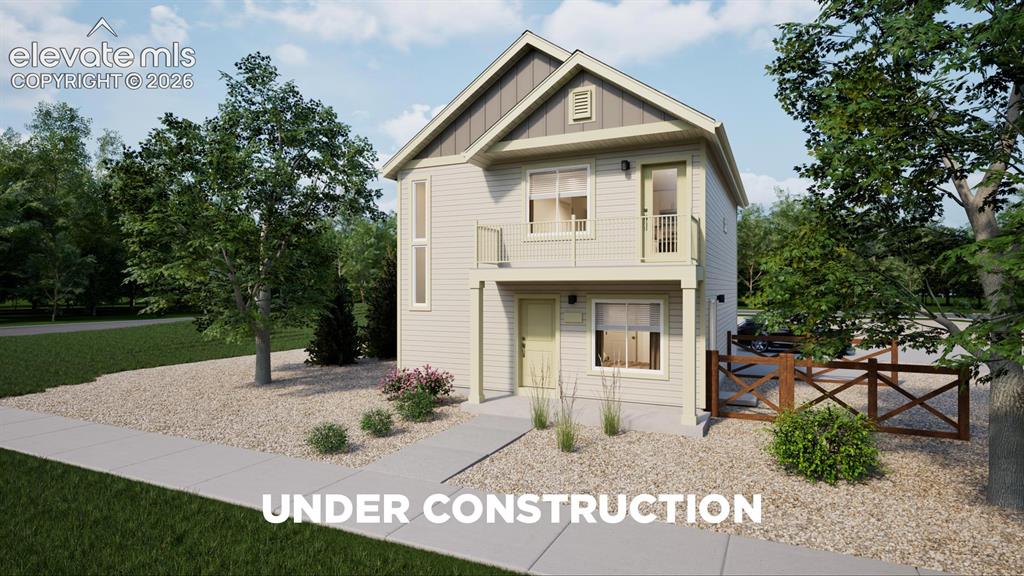 Image 1 of 26: Two-story residence with light-toned siding and contrasting gables