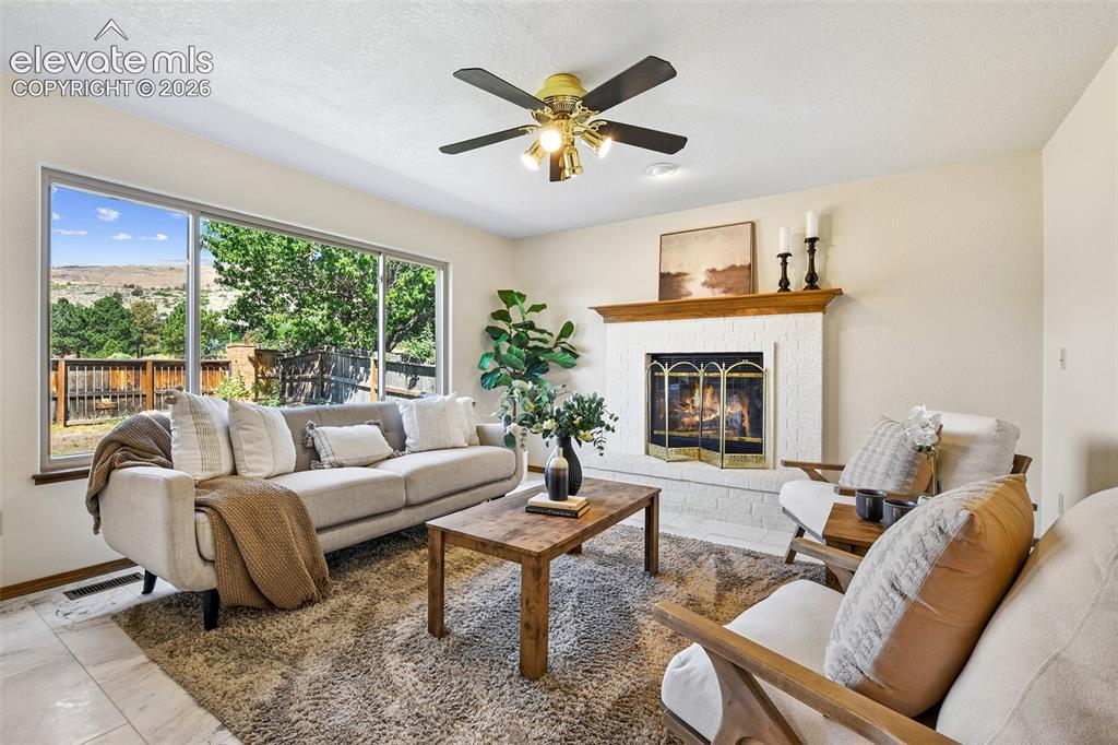 Image 11 of 42: Matte stainless appliances and hardwood floors