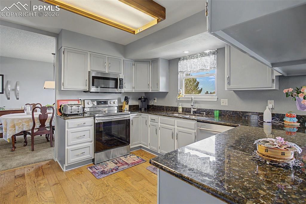Image 13 of 46: Bright and airy kitchen.