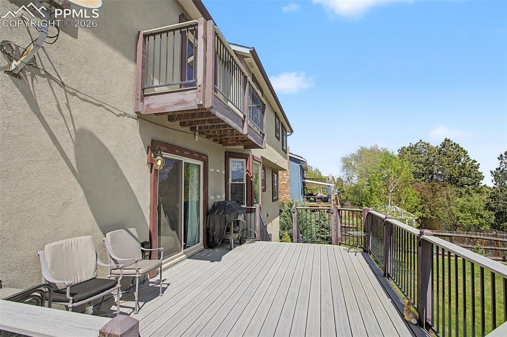 Image 18 of 46: Deck, accessed through the sliding glass door from the family room.
