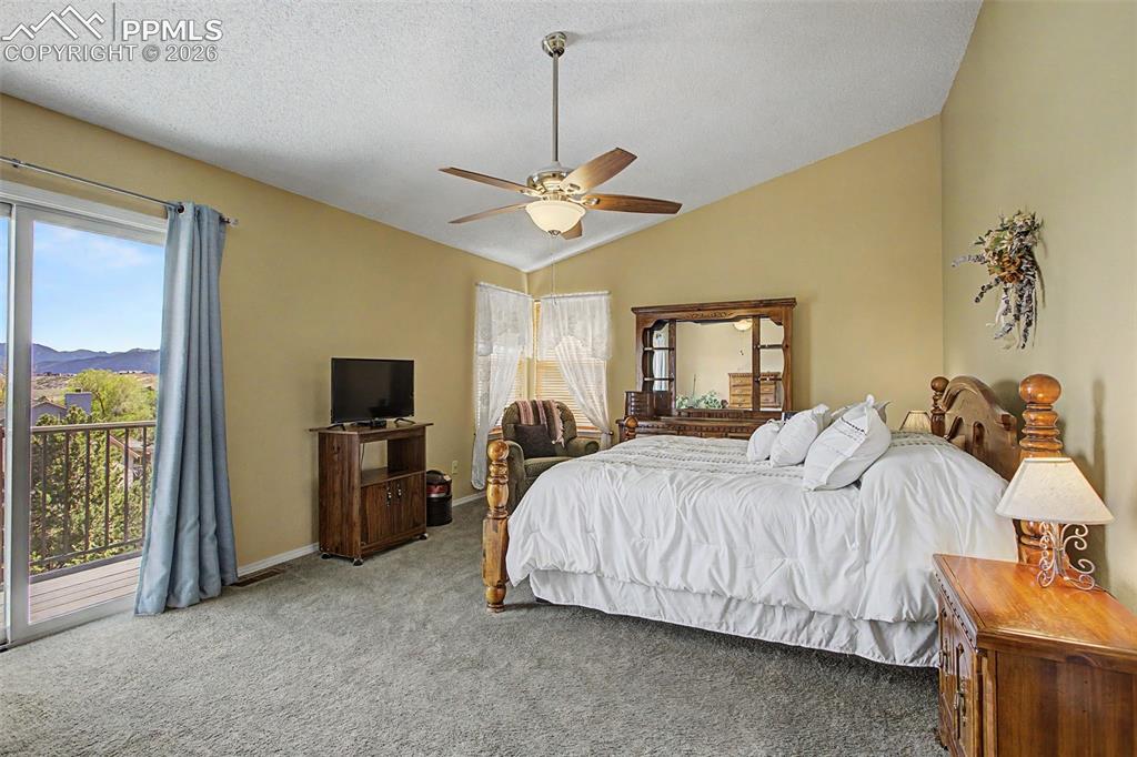 Image 22 of 46: Upper level Primary bedroom.