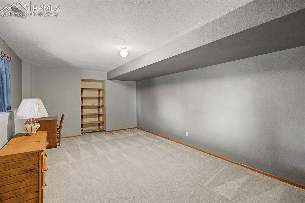 Image 37 of 46: Basement bedroom #5.