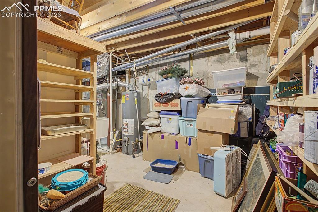 Image 39 of 46: Basement storage area/furnace room.