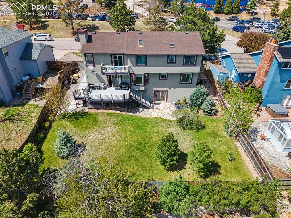 Image 44 of 46: Aerial view of the back of the home.