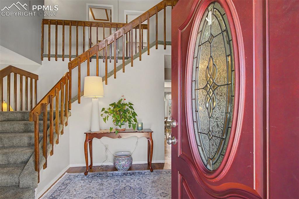Image 7 of 46: Entry looking through the front door.