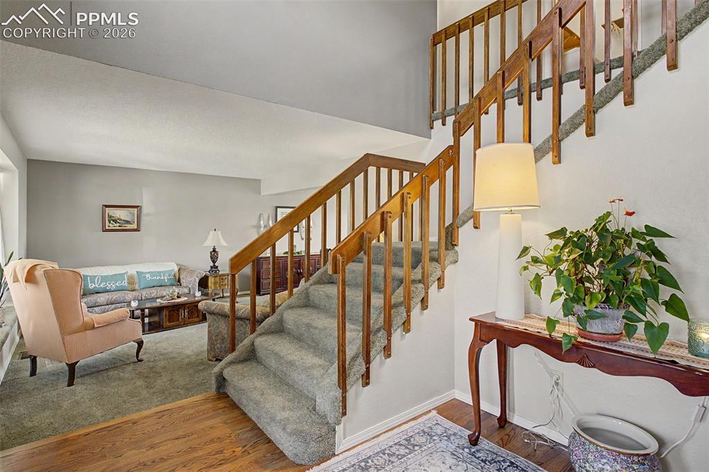 Image 8 of 46: Entrance foyer- walk through the front door to the stairs in front of you,