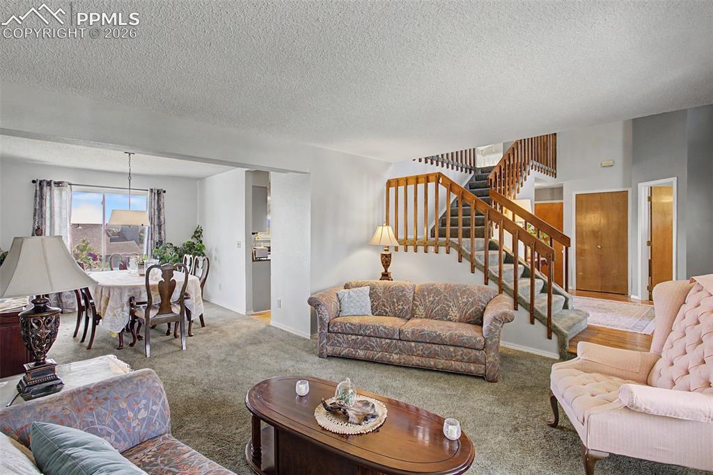 Image 9 of 46: Formal living room, directly to the left upon entry.