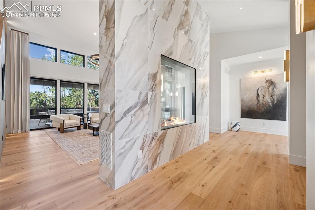 Image 14 of 50: View of Pikes Peak through 5x5 fireplace