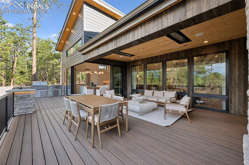 Image 26 of 50: Main Level deck with built in heaters 