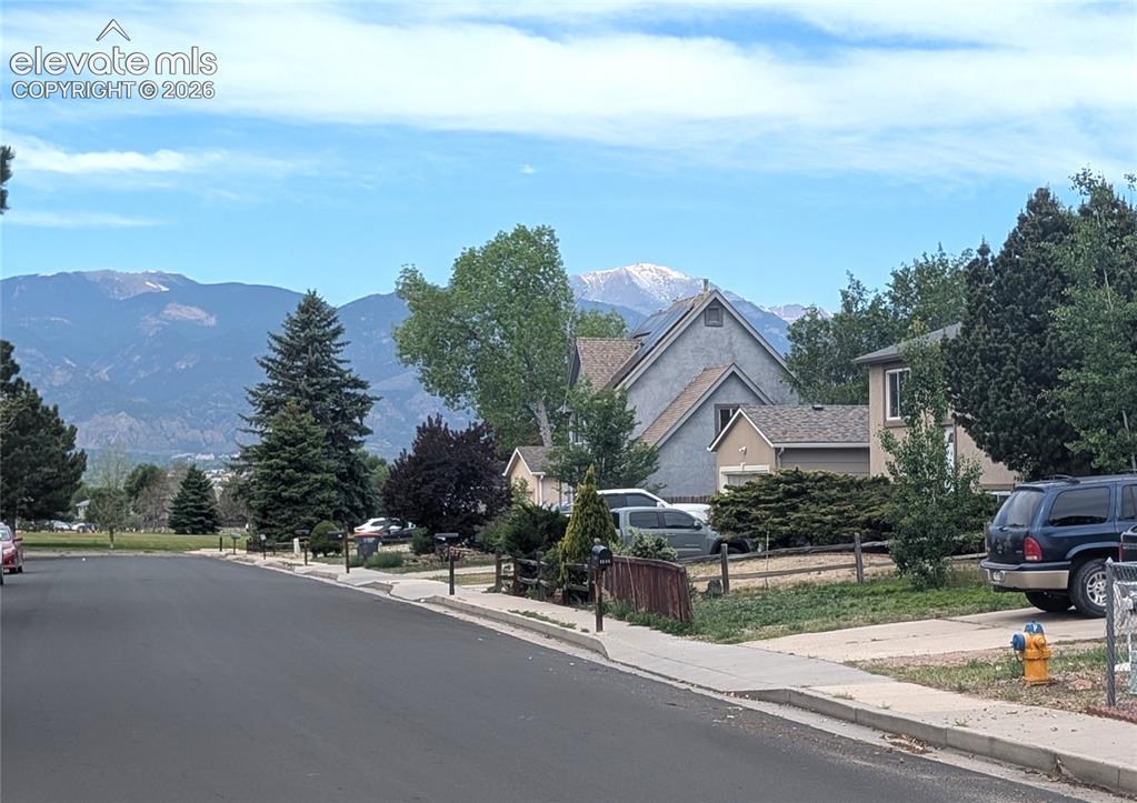 Image 15 of 16: Street view from front of house