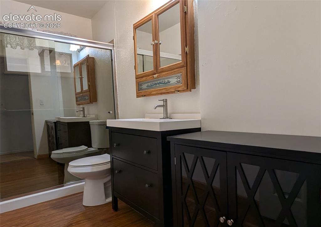 Image 6 of 16: Bathroom, walk-in shower, storage unit