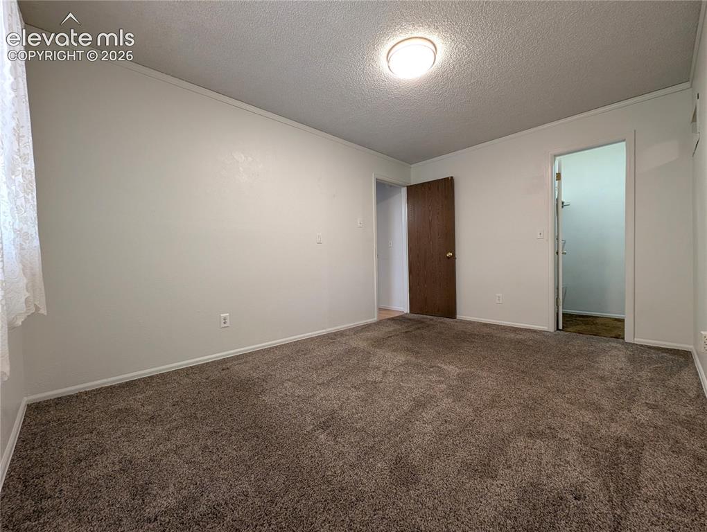 Image 8 of 16: Bedroom 1, walk-in closet, carpet