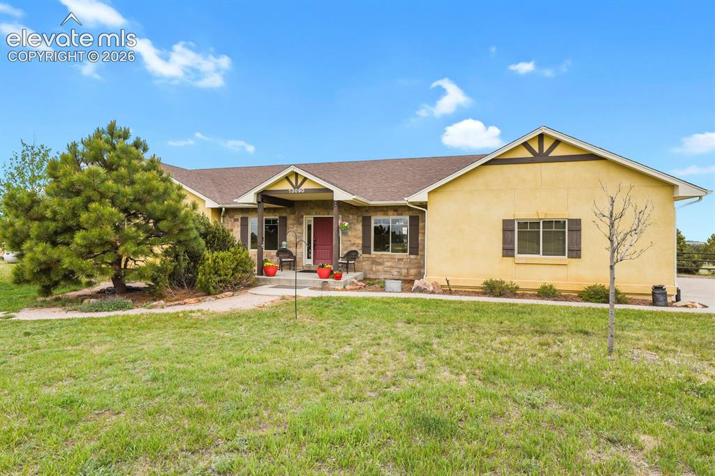 Caption: Beautifully maintained ranch-style home set on 5.42 usable acres.