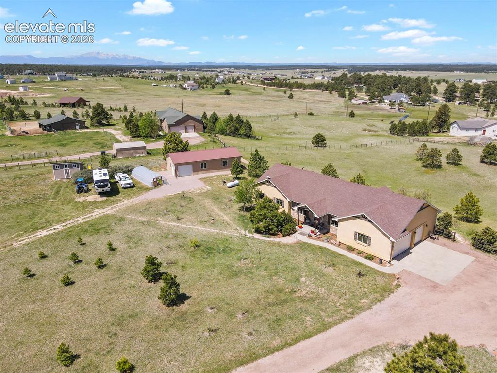 Image 3 of 45: House, workshop, acreage, and mountain views—all in one exceptional propert