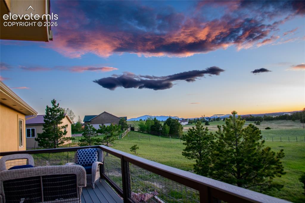 Image 42 of 45: Twilight views of Pikes Peak provide a stunning backdrop to everyday life.