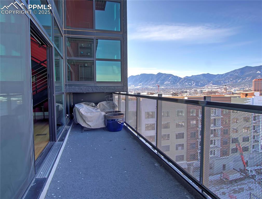 Image 2 of 32: Balcony with a mountain view