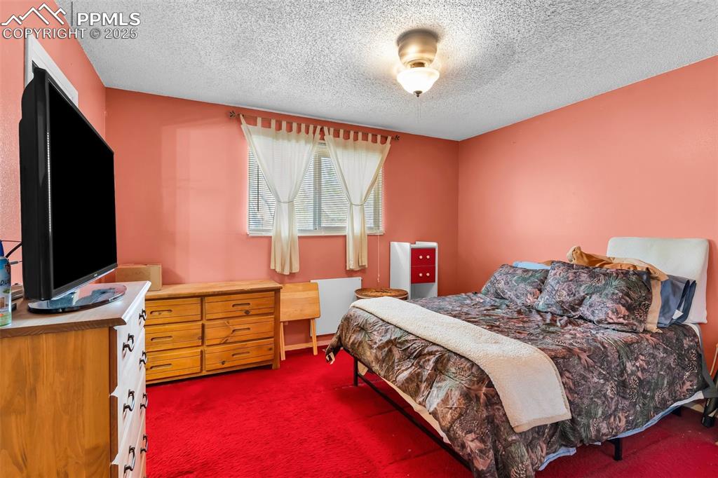 Image 22 of 40: Bedroom